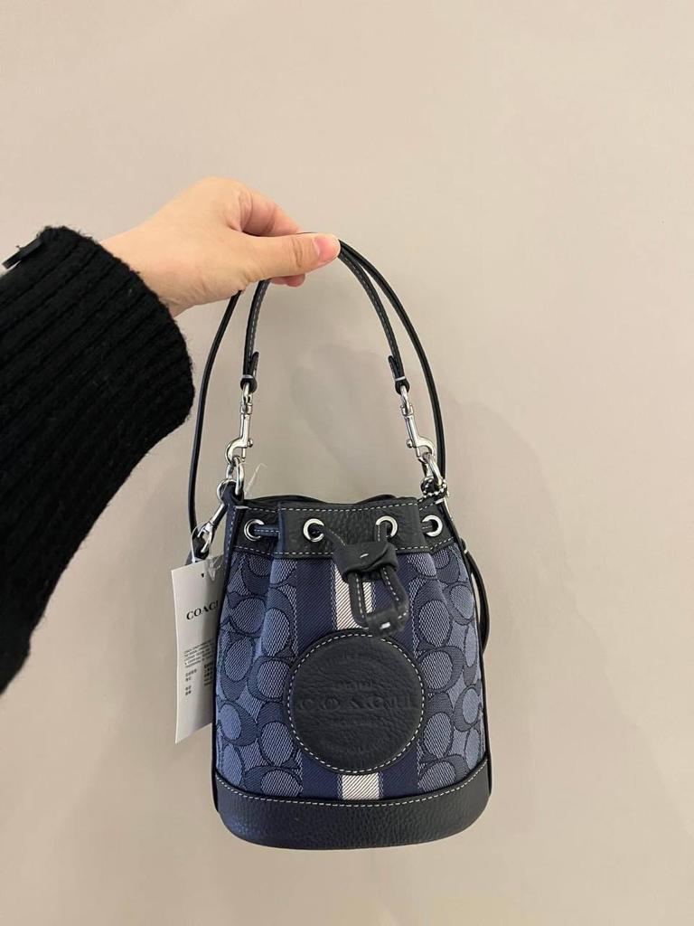 COACH Mini Dempsey Bucket Bag In Signature Jacquard With Stripe And Coach Patch