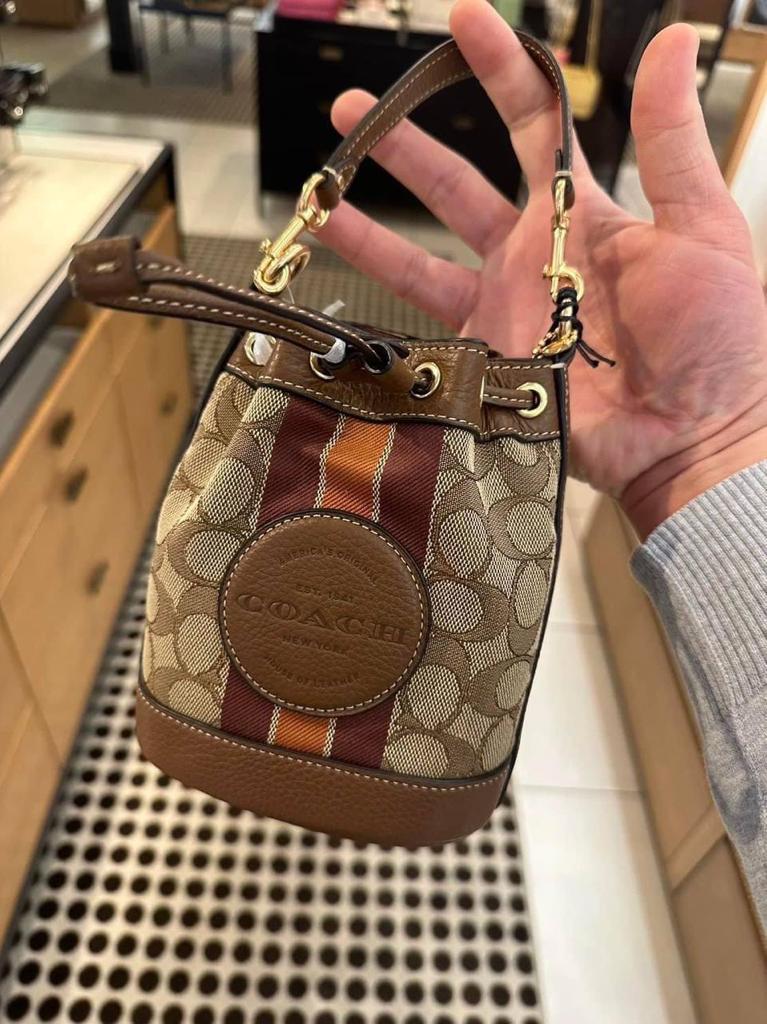 COACH Mini Dempsey Bucket Bag In Signature Jacquard With Stripe And Coach Patch