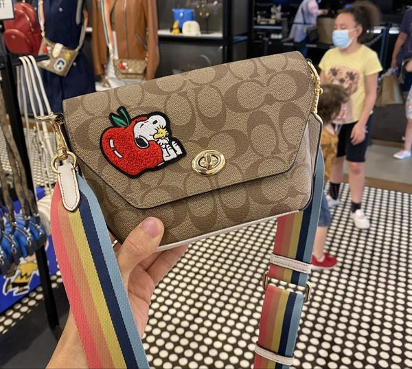 Coach X Peanuts Karlee Crossbody In Signature Canvas With Snoopy