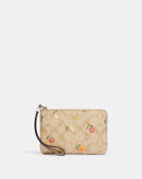 Coach Corner Zip Wristlet In Signature Canvas With Nostalgic Ditsy Print