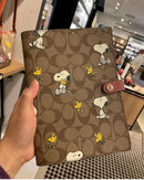 Coach X Peanuts Notebook In Signature Canvas With Snoopy Woodstock Print (Khaki)