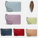 Coach Medium Corner Zip Wristlet