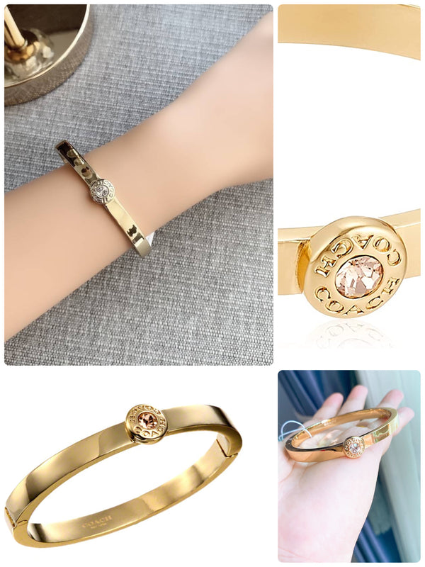 Coach Signature hinged bangle