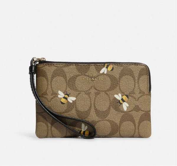 Coach Corner Zip Wristlet In Signature Canvas With Bee Print