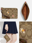 Coach Corner Zip Wristlet In Signature Canvas With Cat Mittens Print